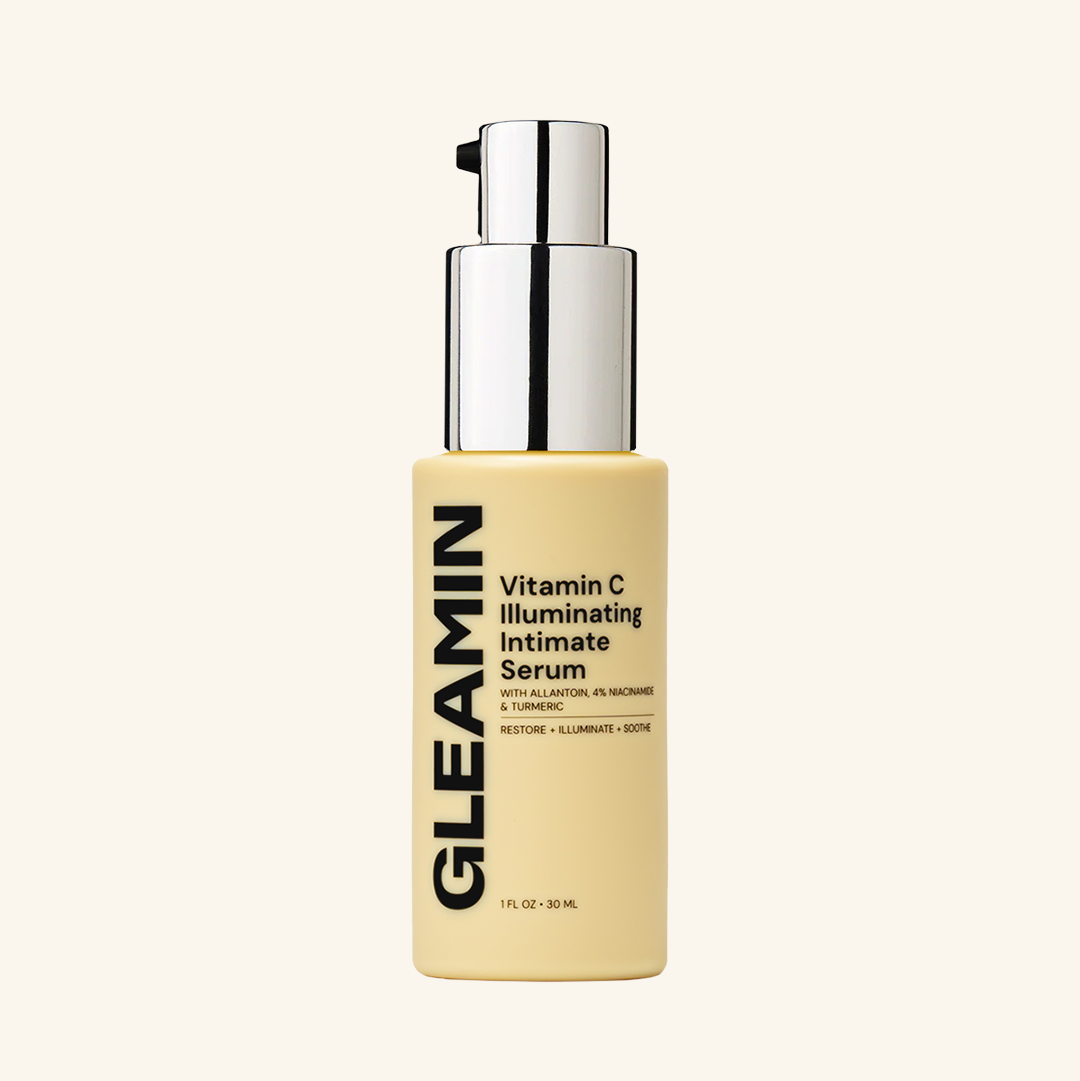 Skin brightening serum in a sleek yellow pump bottle designed to restore, soothe, and illuminate intimate areas
