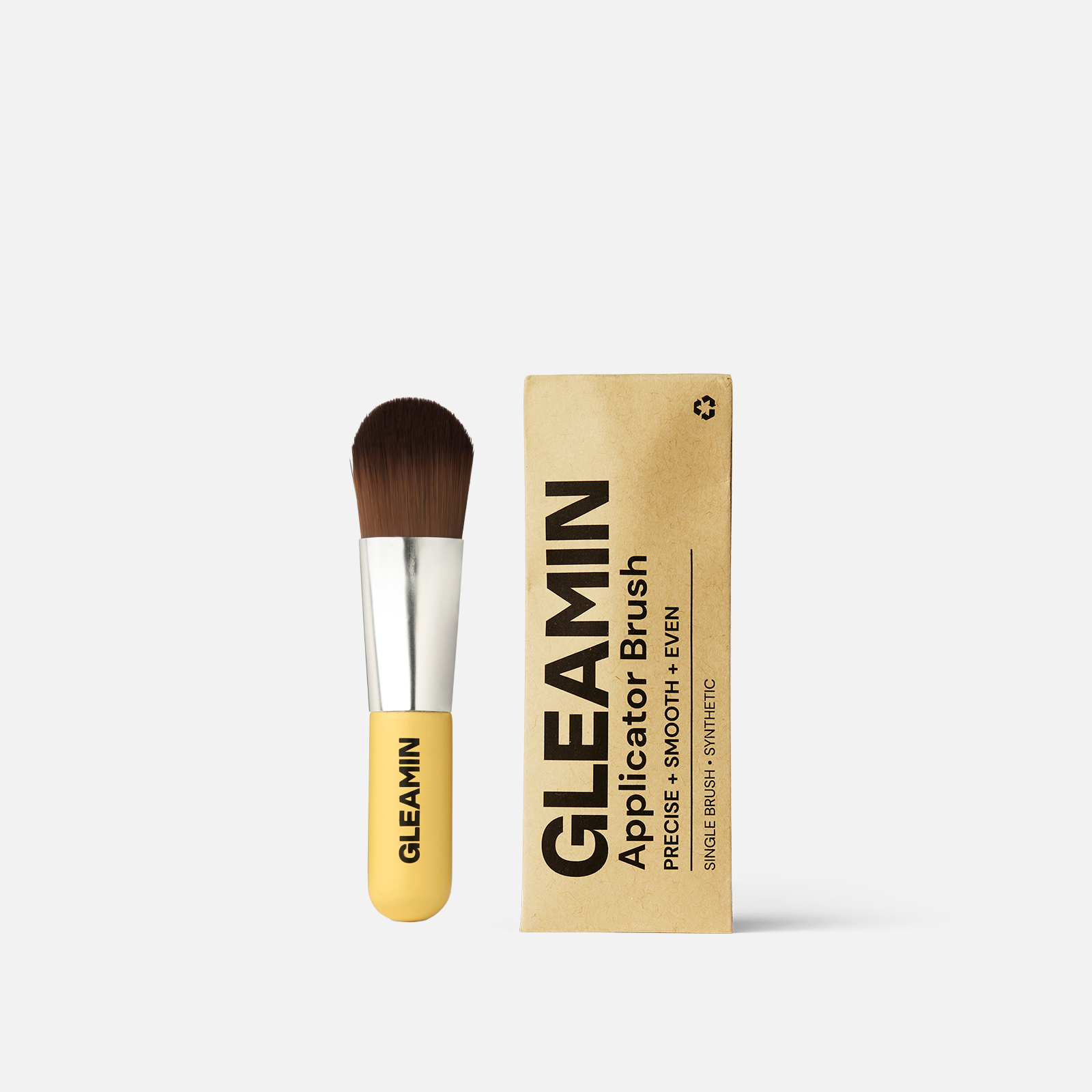 Applicator brush with synthetic bristles and yellow handle shown beside eco-friendly GLEAMIN packaging