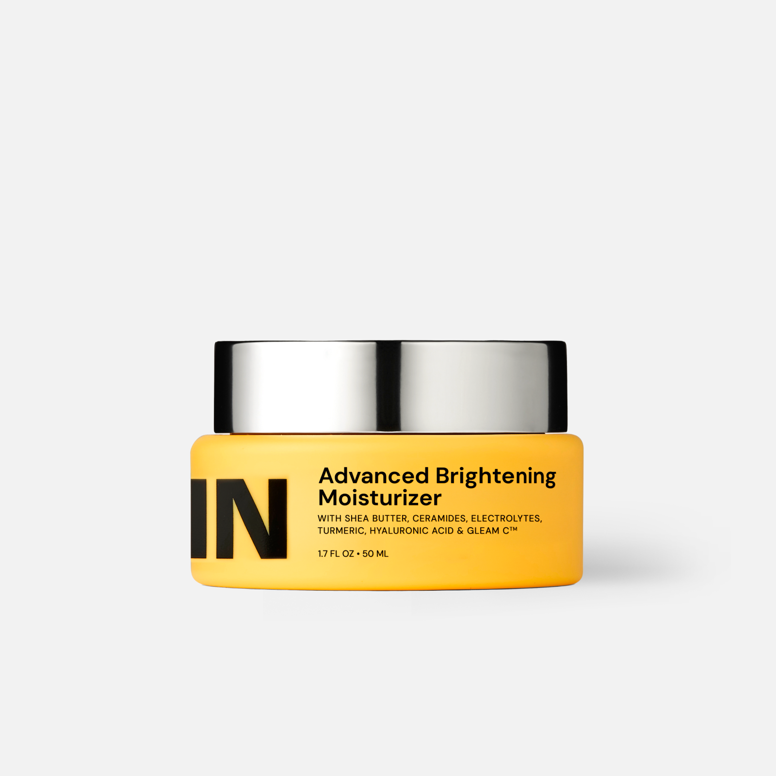 Brightening moisturizer in a yellow jar labeled GLEAMIN with shea butter and hyaluronic acid
