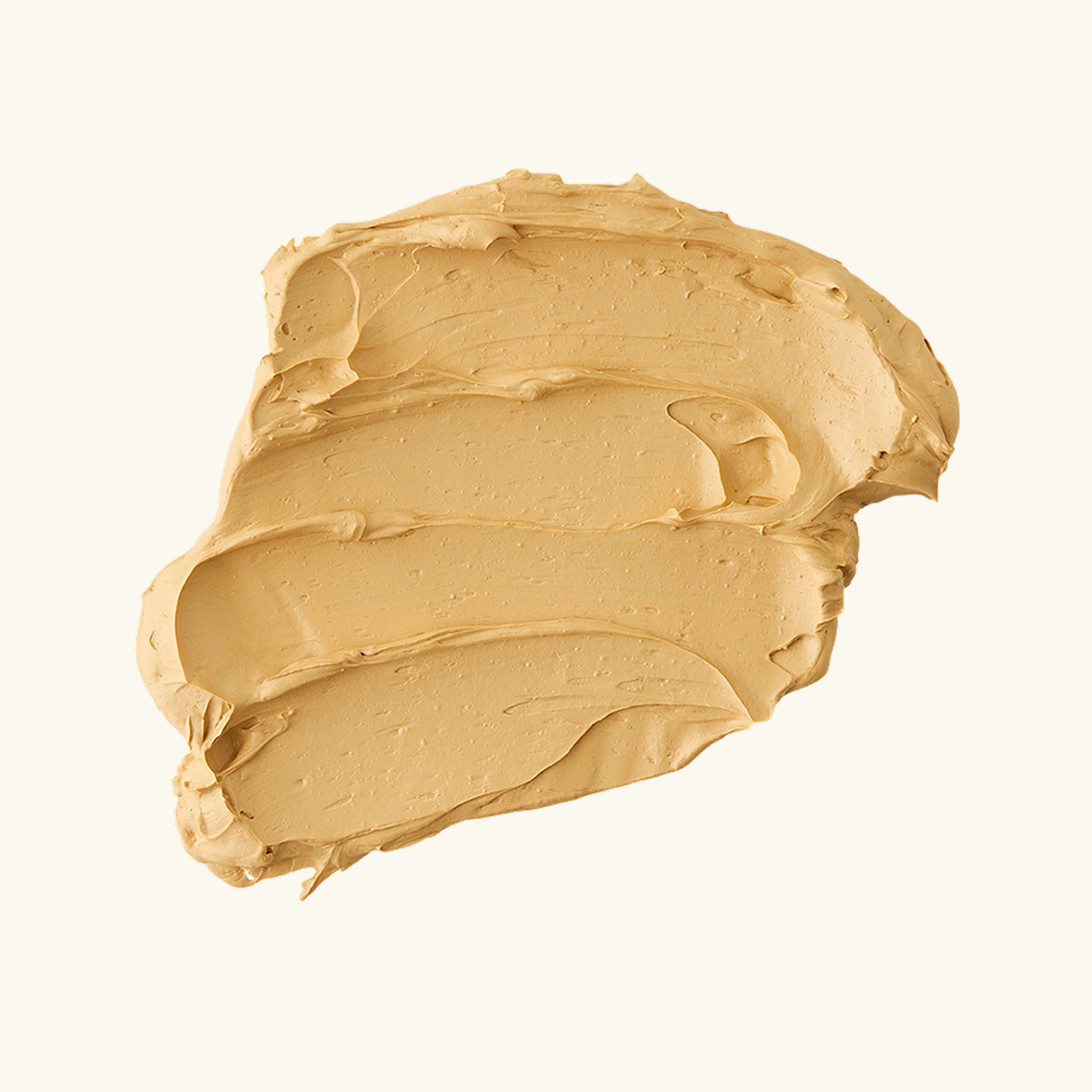 Clay mask swatch in a smooth, golden texture showing rich, creamy consistency for easy and even skin application