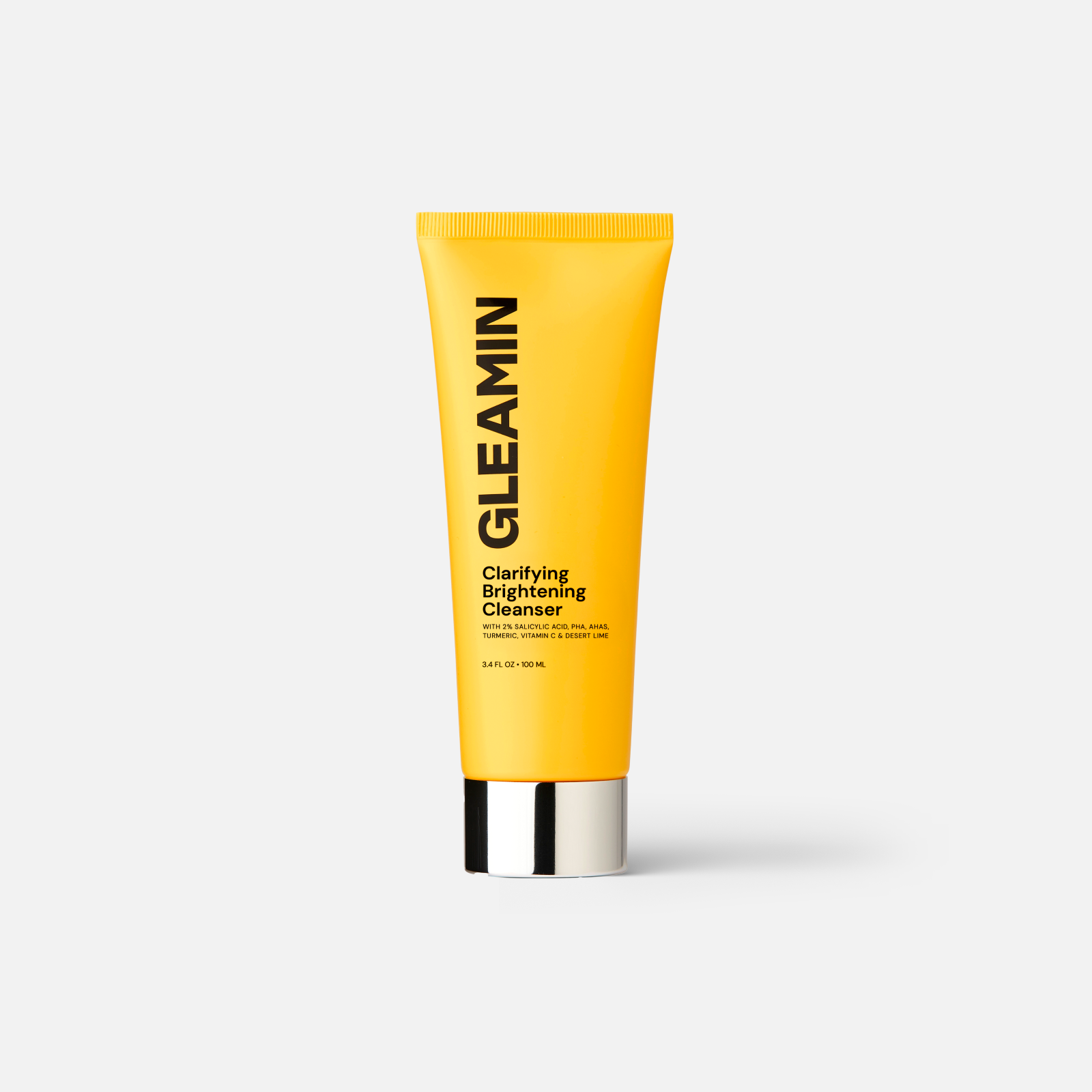 Brightening cleanser in a vibrant yellow tube with silver cap designed to clarify and refresh the skin