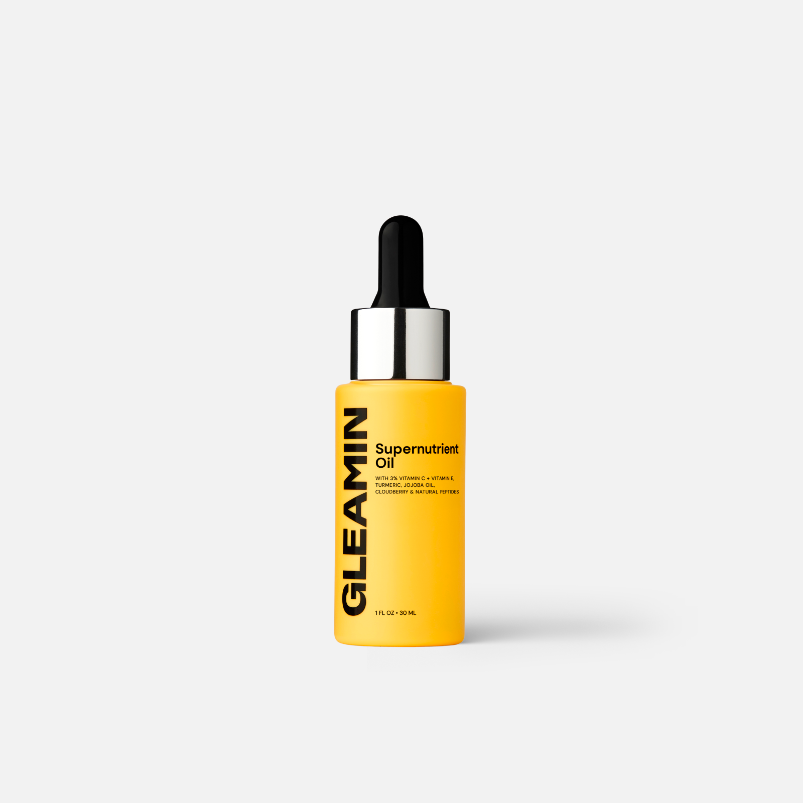 Vitamin C oil in a yellow dropper bottle designed to nourish, hydrate, and brighten the skin